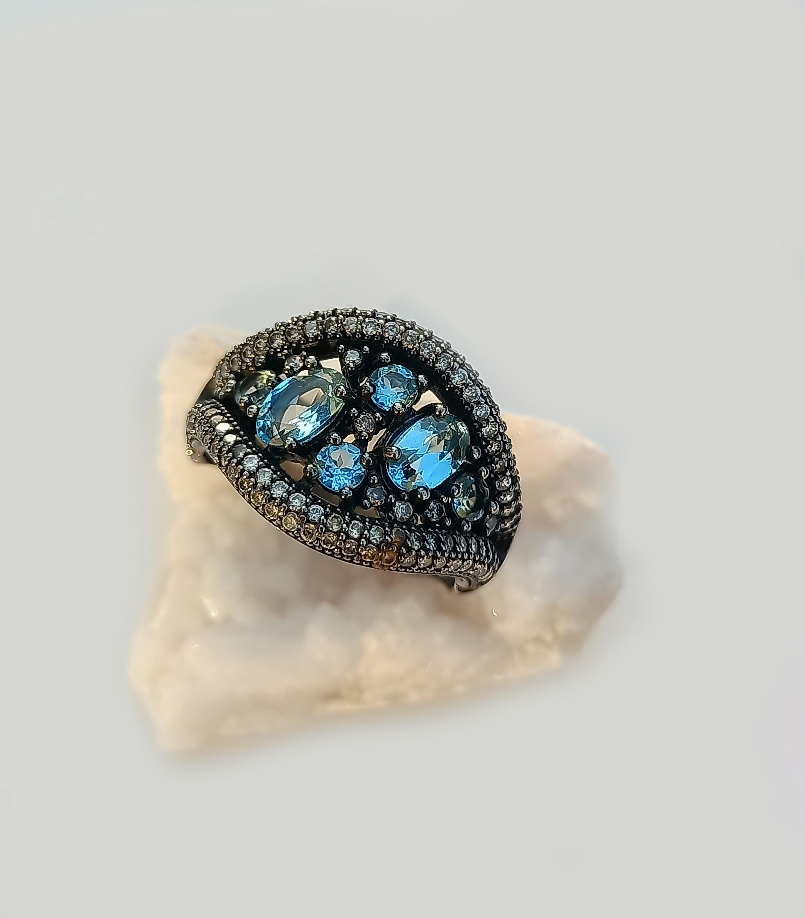Handmade Aquamarine Black Silver Ring: Tranquility Stone Jewelry
